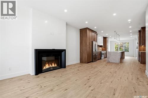 317 11Th Street, Saskatoon, SK - Indoor Photo Showing Other Room With Fireplace
