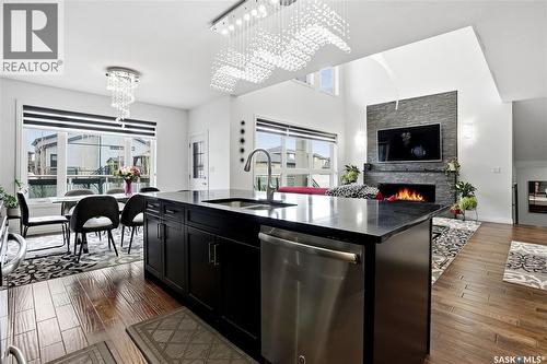 4714 E Green Apple Drive, Regina, SK - Indoor With Fireplace