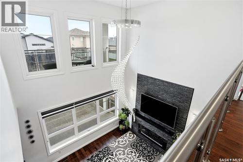 4714 E Green Apple Drive, Regina, SK - Indoor With Fireplace