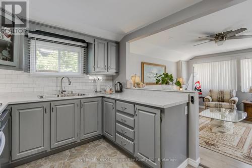 89 Andrew Drive, Tiny, ON - Indoor Photo Showing Kitchen With Double Sink