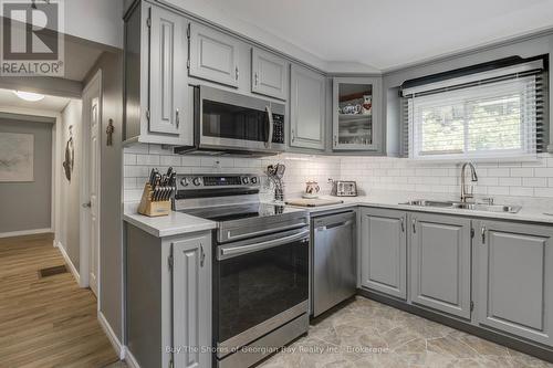 89 Andrew Drive, Tiny, ON - Indoor Photo Showing Kitchen With Double Sink