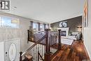 3383 Dent Crescent, Prince Albert, SK  - Indoor Photo Showing Other Room With Fireplace 