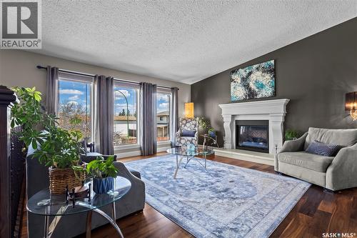3383 Dent Crescent, Prince Albert, SK - Indoor Photo Showing Living Room With Fireplace
