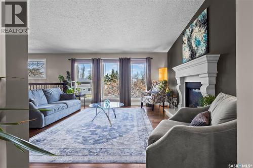 3383 Dent Crescent, Prince Albert, SK - Indoor Photo Showing Living Room With Fireplace