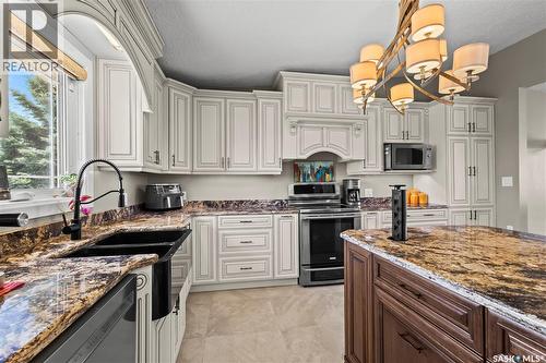 3383 Dent Crescent, Prince Albert, SK - Indoor Photo Showing Kitchen With Double Sink With Upgraded Kitchen