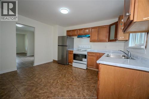 380 Chappell, Windsor, ON - Indoor Photo Showing Kitchen With Double Sink
