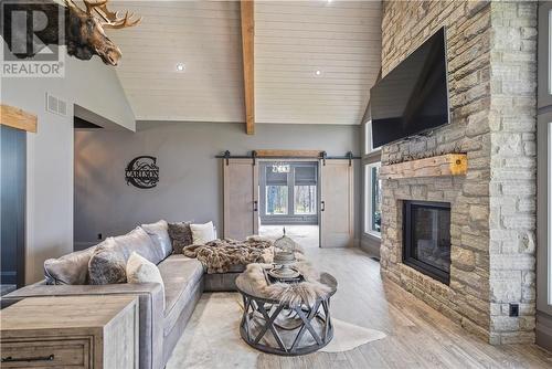 3 Pine Drive, Blind River, ON - Indoor Photo Showing Living Room With Fireplace