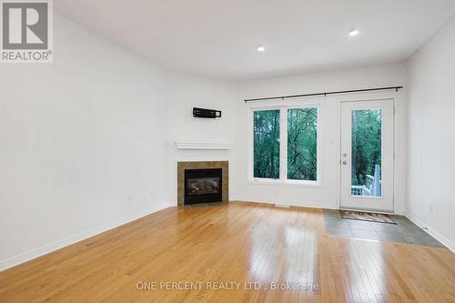 1048 Redtail Private, Ottawa, ON - Indoor Photo Showing Living Room With Fireplace