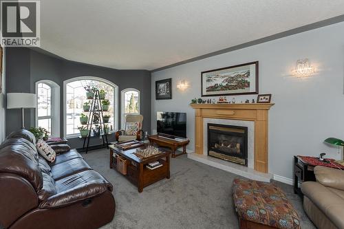 3022 Christopher Crescent, Prince George, BC - Indoor Photo Showing Living Room With Fireplace