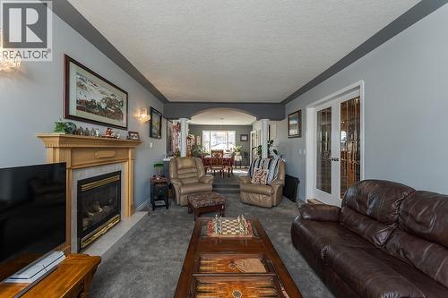3022 Christopher Crescent, Prince George, BC - Indoor Photo Showing Living Room With Fireplace