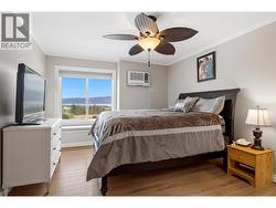 Primary Bedroom w/Lake Views - 