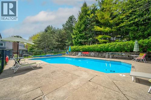 270 Morrison Road Unit# 7C, Kitchener, ON - Outdoor With In Ground Pool With Deck Patio Veranda
