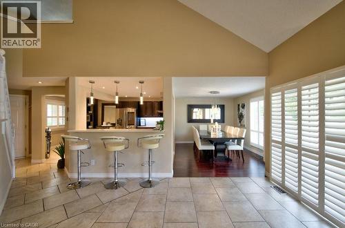 Open concept to Kitchen and Dining room - 270 Morrison Road Unit# 7C, Kitchener, ON - Indoor With Fireplace