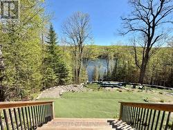 Stairs from Lower Level Deck to Terraced Lot - 