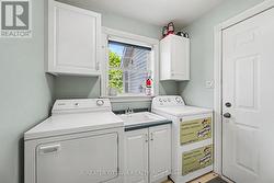 Laundry room on the main floor is big and bright - 