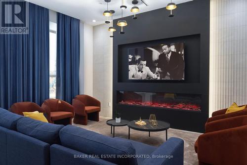 Northshore Amenities - 314 - 500 Plains Road E, Burlington, ON - Indoor Photo Showing Living Room With Fireplace