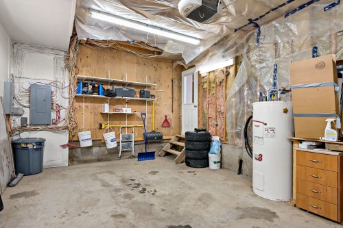 Garage - 7 Rue St-André, Mont-Blanc, QC - Indoor Photo Showing Basement