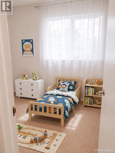 #314-7450 Rupert St, Port Hardy, BC - Indoor Photo Showing Bedroom
