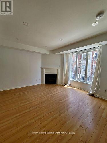 344 - 3 Everson Drive, Toronto, ON - Indoor Photo Showing Other Room With Fireplace