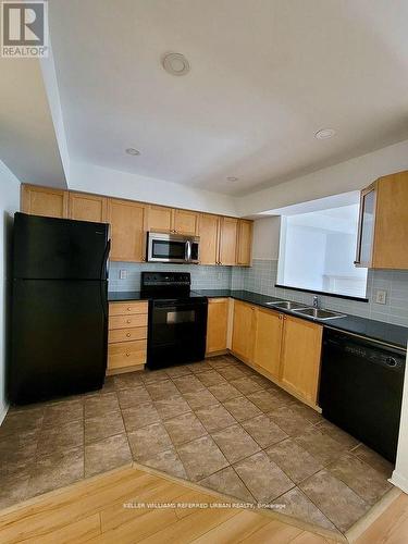 344 - 3 Everson Drive, Toronto, ON - Indoor Photo Showing Kitchen With Double Sink