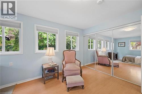 Room featuring wood-finish flooring and light blue walls - 50 Lewis Crescent, Kitchener, ON - Indoor