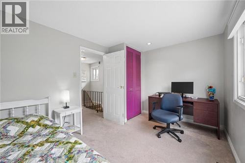 Light-filled room featuring neutral wall tones, carpeted flooring, and a window providing natural light - 50 Lewis Crescent, Kitchener, ON - Indoor Photo Showing Bedroom