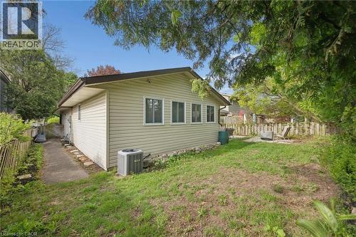 Expansive backyard with a level lawn and mature perimeter trees - 50 Lewis Crescent, Kitchener, ON - Outdoor