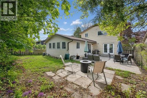 Expansive paver patio with multiple seating areas - 50 Lewis Crescent, Kitchener, ON - Outdoor With Deck Patio Veranda