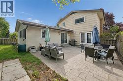 Expansive stamped concrete patio with multiple access points to the home - 