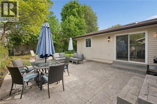 Spacious stamped concrete patio with multiple outdoor areas - 50 Lewis Crescent, Kitchener, ON - Outdoor With Deck Patio Veranda With Exterior
