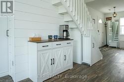 Custom storage areas under the stairs - 