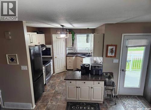 228 6Th Avenue N, Big River, SK - Indoor Photo Showing Kitchen With Double Sink