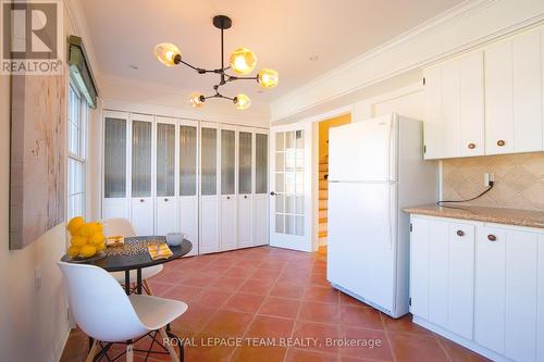Kitchen also houses laundry facilities - 8 Moorside Private, Ottawa, ON - Indoor Photo Showing Other Room