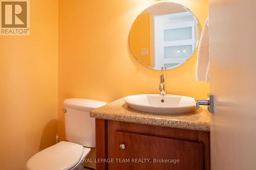 Ground floor powder room, granite countertop - 8 Moorside Private, Ottawa, ON - Indoor Photo Showing Bathroom
