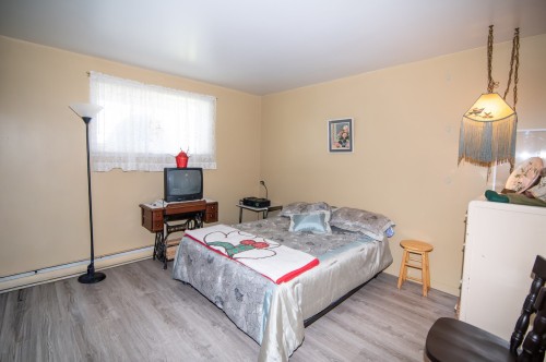 Logement - 649  - 651 Av. Langlais, Saint-Pascal, QC - Indoor Photo Showing Bedroom