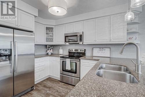 149 Carnwith Drive E, Whitby, ON - Indoor Photo Showing Kitchen With Double Sink
