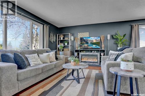23 Hind Street, Regina, SK - Indoor Photo Showing Living Room With Fireplace