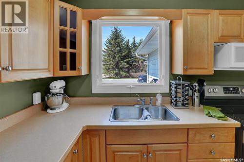 23 Hind Street, Regina, SK - Indoor Photo Showing Kitchen With Double Sink