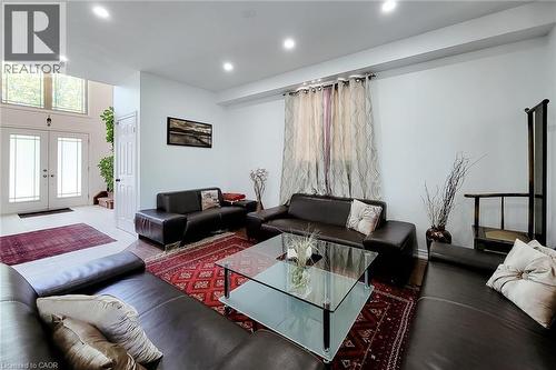 Spacious living area featuring recessed lighting and light-toned walls - 197 Cloverleaf Drive, Ancaster, ON - Indoor Photo Showing Living Room