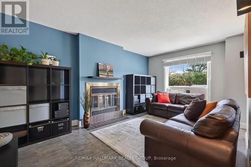79 Dossetter Way, Ottawa, ON - Indoor Photo Showing Living Room With Fireplace