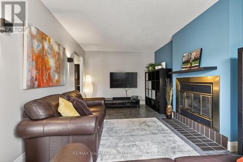 79 Dossetter Way, Ottawa, ON - Indoor Photo Showing Living Room With Fireplace
