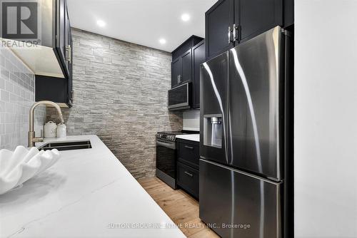 209 - 764 River Road E, Wasaga Beach, ON - Indoor Photo Showing Kitchen With Double Sink With Upgraded Kitchen