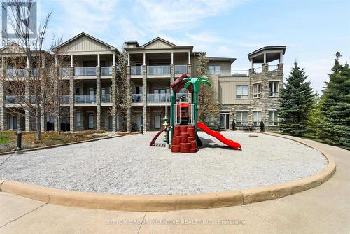 209 - 764 River Road E, Wasaga Beach, ON - Outdoor With Balcony With Facade
