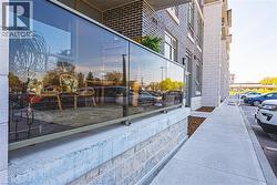 Building exterior featuring dark brick and light-colored block construction - 