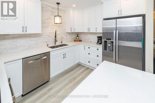 486 Code Drive, Montague, ON - Indoor Photo Showing Kitchen With Double Sink