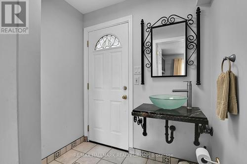 Powder room / door to carport - 1230 Major Street, Ottawa, ON - Indoor Photo Showing Other Room