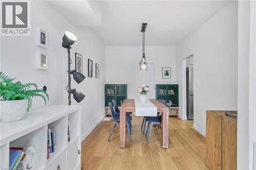 Open-concept room featuring wood-finish flooring, white walls, and a recessed ceiling - 501 Ferguson Avenue N, Hamilton, ON - Indoor Photo Showing Dining Room