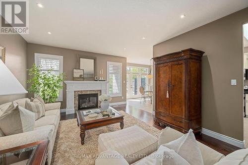 28 - 2615 Colonel Talbot Road, London South (South K), ON - Indoor Photo Showing Living Room With Fireplace