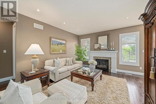 28 - 2615 Colonel Talbot Road, London South (South K), ON - Indoor Photo Showing Living Room With Fireplace