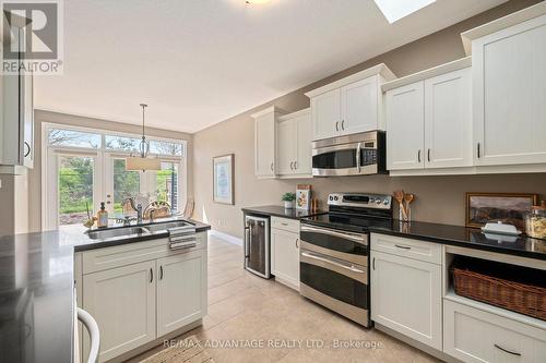 28 - 2615 Colonel Talbot Road, London South (South K), ON - Indoor Photo Showing Kitchen With Stainless Steel Kitchen With Double Sink